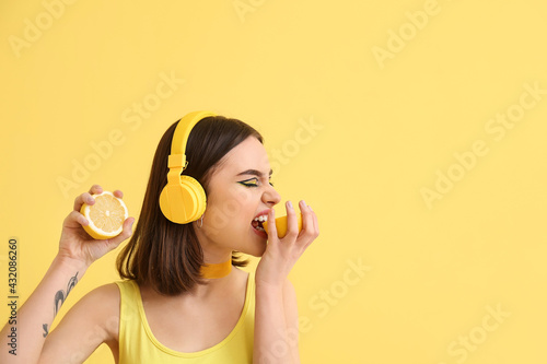 Stylish young woman with he...
