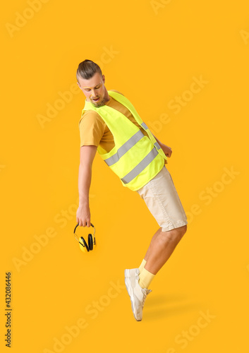 Stylish male worker with he...