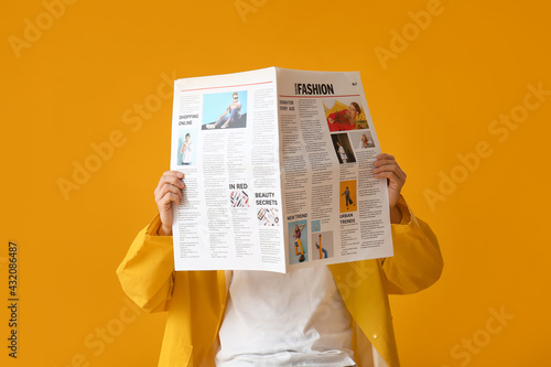 Stylish young man with news...