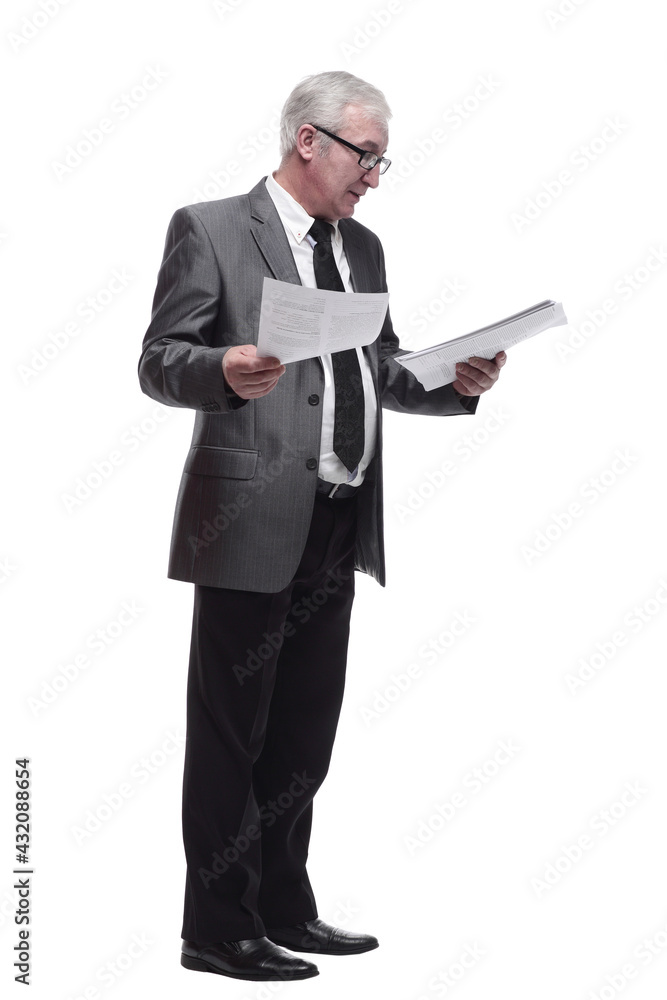 in full growth. Mature business man with a digital tablet. in full growth. Mature business man with a digital tablet.