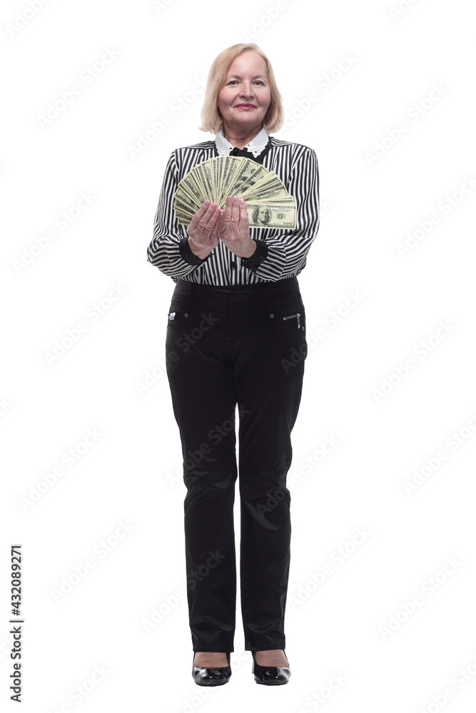 in full growth. attractive business woman with a fan of banknotes in full growth. attractive business woman with a fan of banknotes