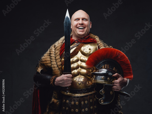 Принти на полотні Joyful ancient roman soldier holding short sword