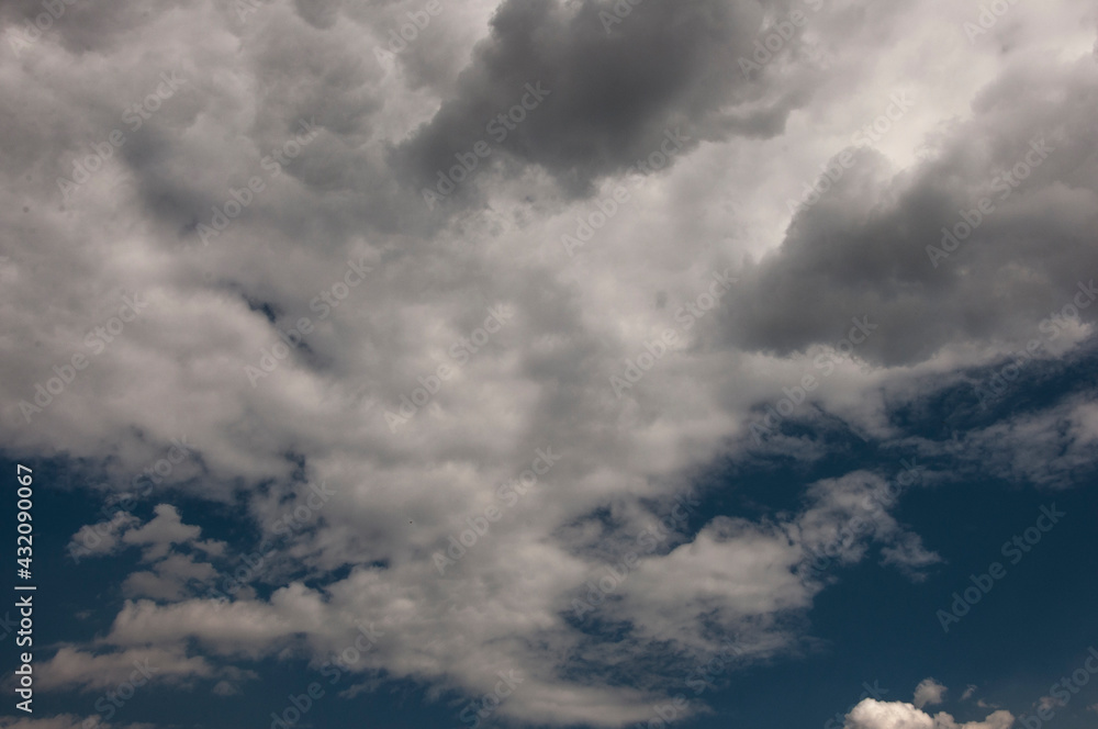 High blue clear sky and light clouds