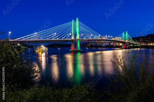 Tilikum Crossing Bridge across the Willamette river in Portland, Oregon, at dusk
