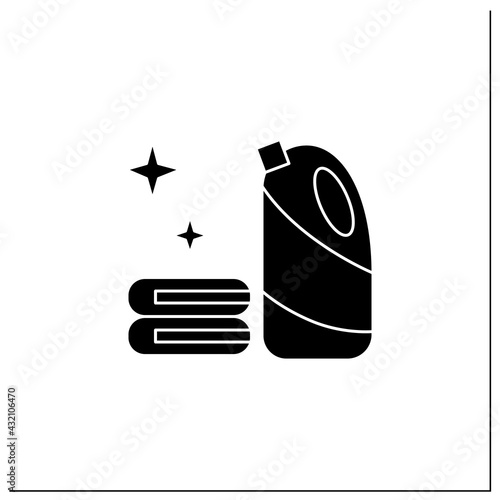 Bleach glyph icon.Household chemical bottle with laundry pile.Clothes washing,disinfection,house cleaning,hygiene, stain removing and bleaching.Filled flat sign.Isolated silhouette vector illustration
