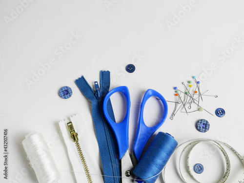 Sewing accessories on a light background
