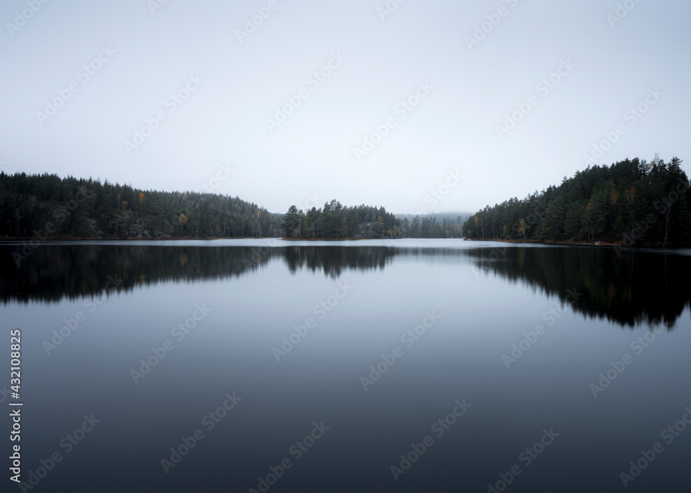Hazy morning mood at a lake in sweden
