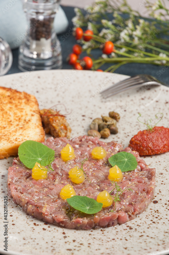 beef tartare with mushroom caviar and red pepper mousse