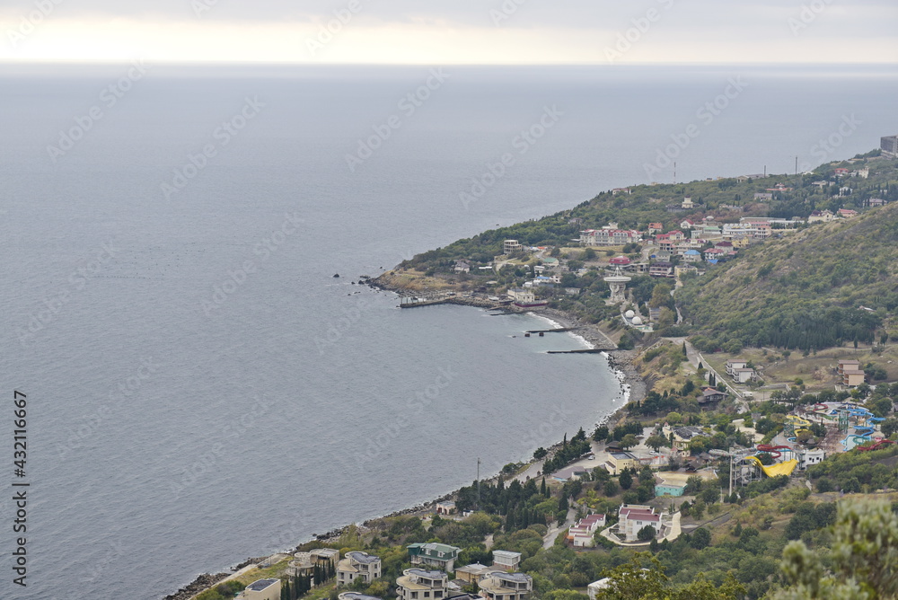 Sevastopol, Crimea - 10.15.2015 : City buildings and various vegetation on the Black Sea coast.