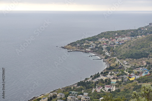 Sevastopol, Crimea - 10.15.2015 : City buildings and various vegetation on the Black Sea coast.