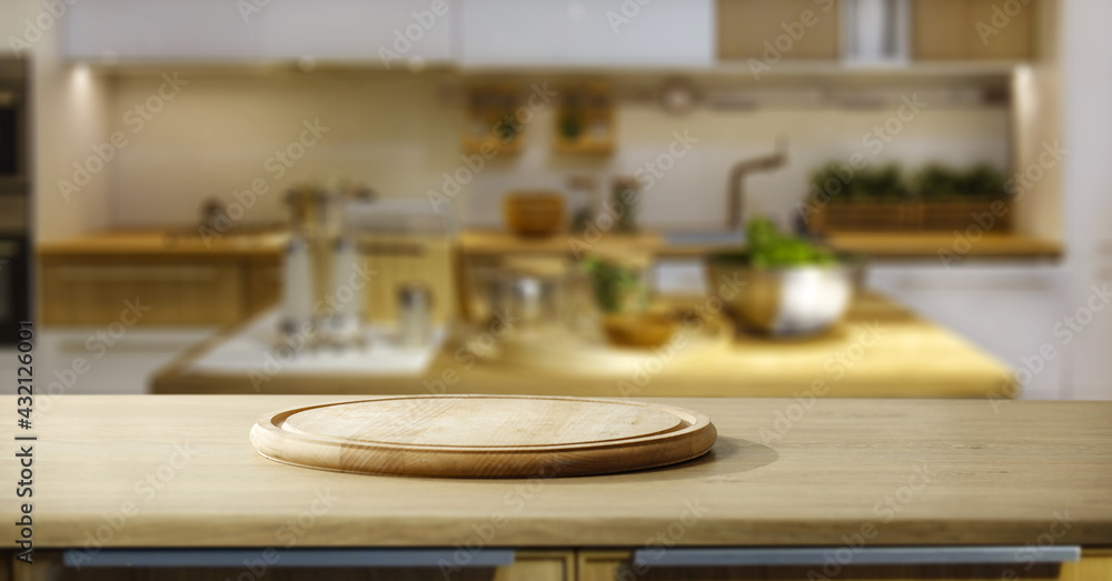 Fototapeta premium Table background of free space and kitchen interior