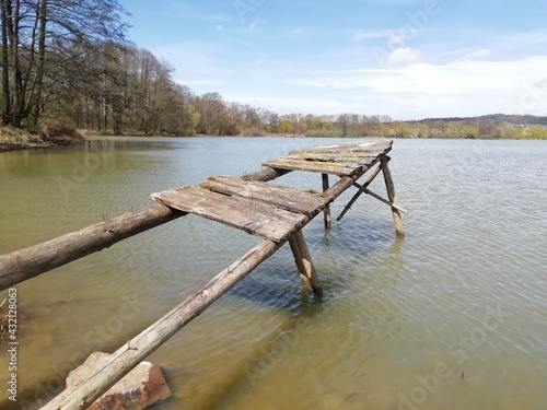 wooden bridge over the lake