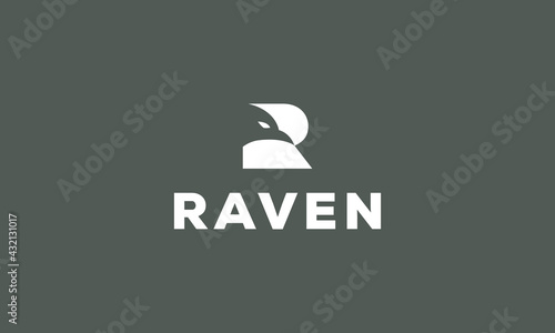 Letter R With Raven In Negative Space logo vector icon illustration