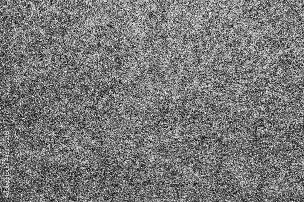 Fototapeta premium Grey monochrome melange felt texture