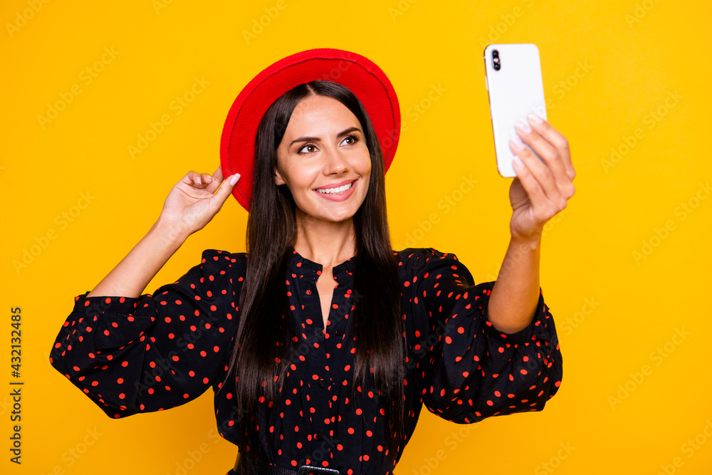 Naklejka premium Photo of cute sweet young lady dressed black clothes arm cap tacking selfie modern gadget isolated yellow color background