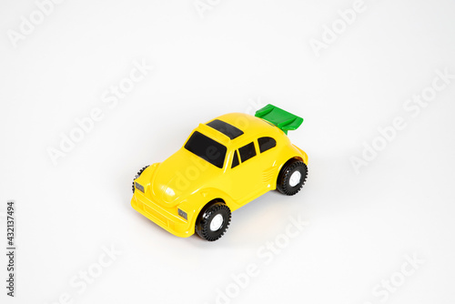 Toy plastic car isolated on white background.