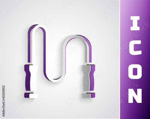 Paper cut Jump rope icon isolated on grey background. Skipping rope. Sport equipment. Paper art style. Vector