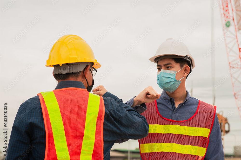Engineer Worker Working teamwork on site construction , Man wear mask covid19 Engineer Worker Working teamwork on site construction , Man wear mask covid19