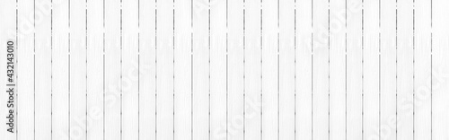 Panorama of New White vintage wooden wall texture and background seamless or a white wooden fence