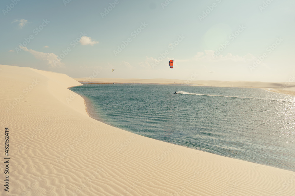 kitesurfing in a lagoon in Brazil Lençóis Maranhenses