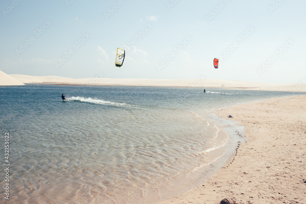 kitesurfing in a lagoon in Brazil Lençóis Maranhenses