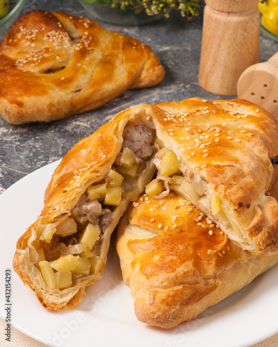 puff pastry pie with potatoes and chicken photo