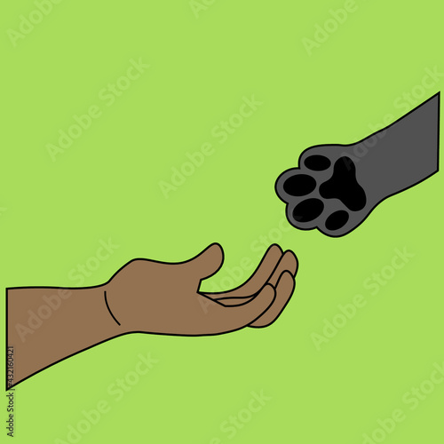 Hold out your hand to paw. Give a home to a stray pet. A human hand and a cat's paw. Advertising for an animal shelter.