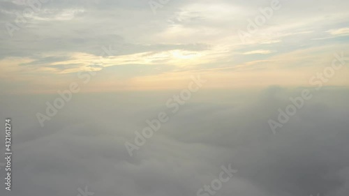 Wallpaper Mural Fly on the clouds with the morning sun Clouds move gently in the sky and sun light.	 Torontodigital.ca