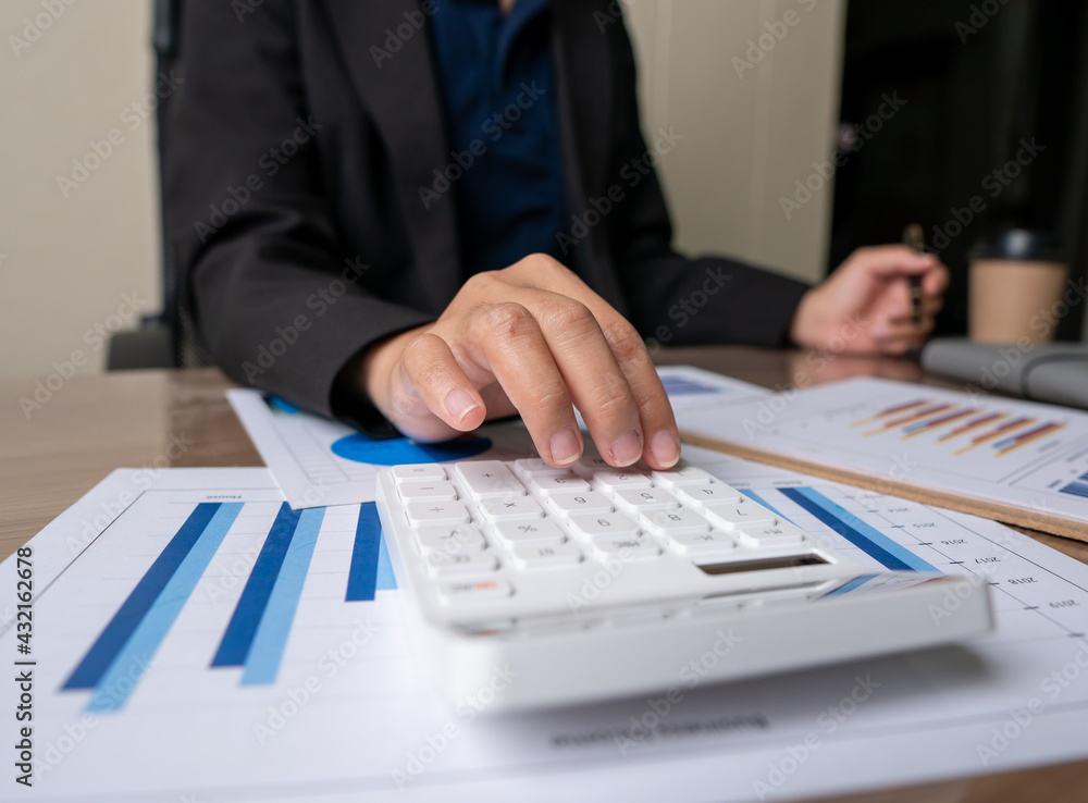 bookkeeper or financial inspector hands making report, calculating or checking balance. Home finances, investment, economy, saving money or insurance concept bookkeeper or financial inspector hands making report, calculating or checking balance. Home finances, investment, economy, saving money or insurance concept