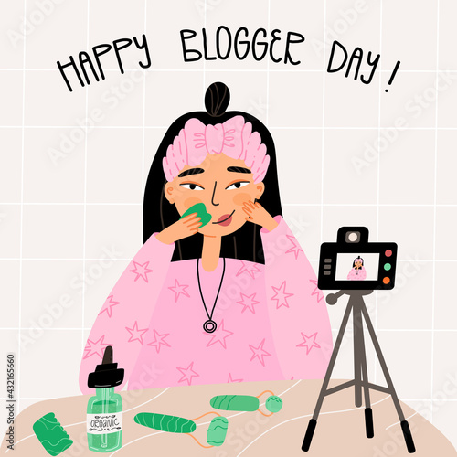 Girl shows beauty routine with gua sha scraper and face serum, digital camera records. Happy blogger day lettering. 