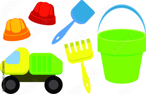 Children's bucket, shovel and rake, sand moulds isolated on a white background. A set of toys for children a sandbox and a playground, a small bucket, a spatula and molds. 
