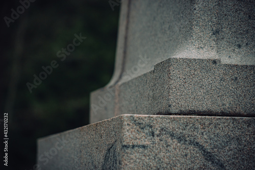 detail of hand carved granite monument found in Latvia. Copy space.