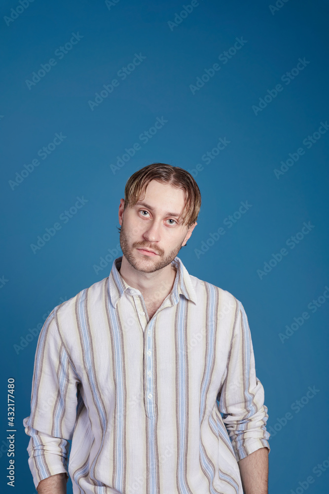 Man looking at camera, studio shot Man looking at camera, studio shot