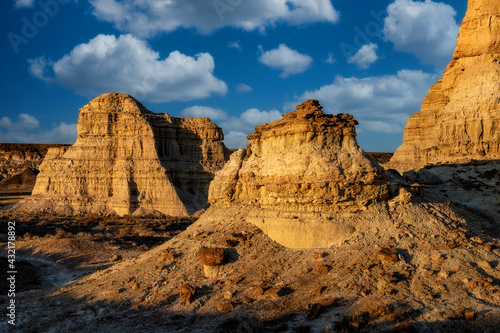 Desert landscape with clouds in the sky above