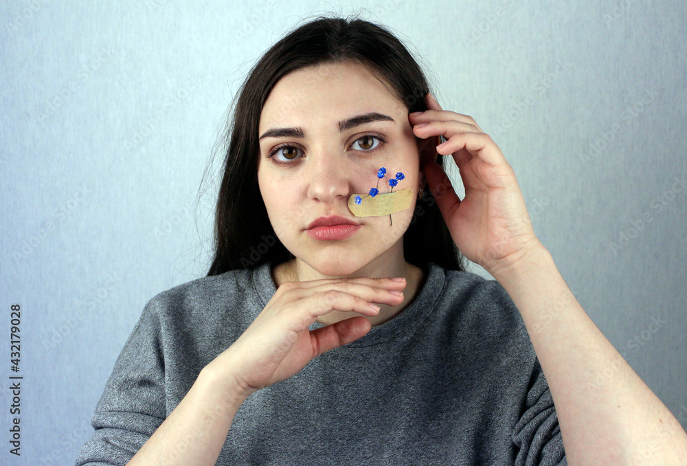 Fototapeta premium Spring bloom time. Blooming branch with green leaves