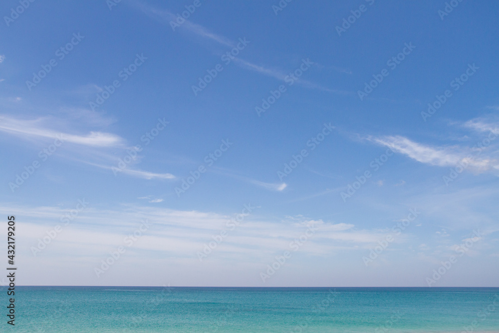 Blue sky and azure sea. Seascape and horizon line
