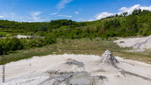 salty volcanoes of nirano geological formations natural park photo