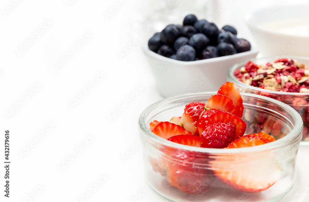 Ingredients for a healthy breakfast. Muesli, berries and yogurt. Healthy eating. Sports fitness menu. Concept. Copy space. High quality photo Ingredients for a healthy breakfast. Muesli, berries and yogurt. Healthy eating. Sports fitness menu. Concept. Copy space. High quality photo