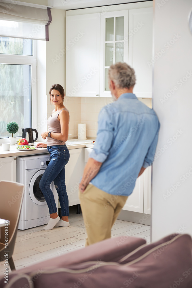 Fototapeta premium Kind male person leaning on the wall