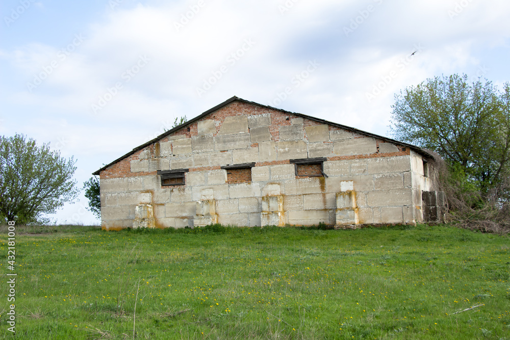 New buildings and old buildings grain storage hangars in the countryside of Ukraine New buildings and old buildings grain storage hangars in the countryside of Ukraine