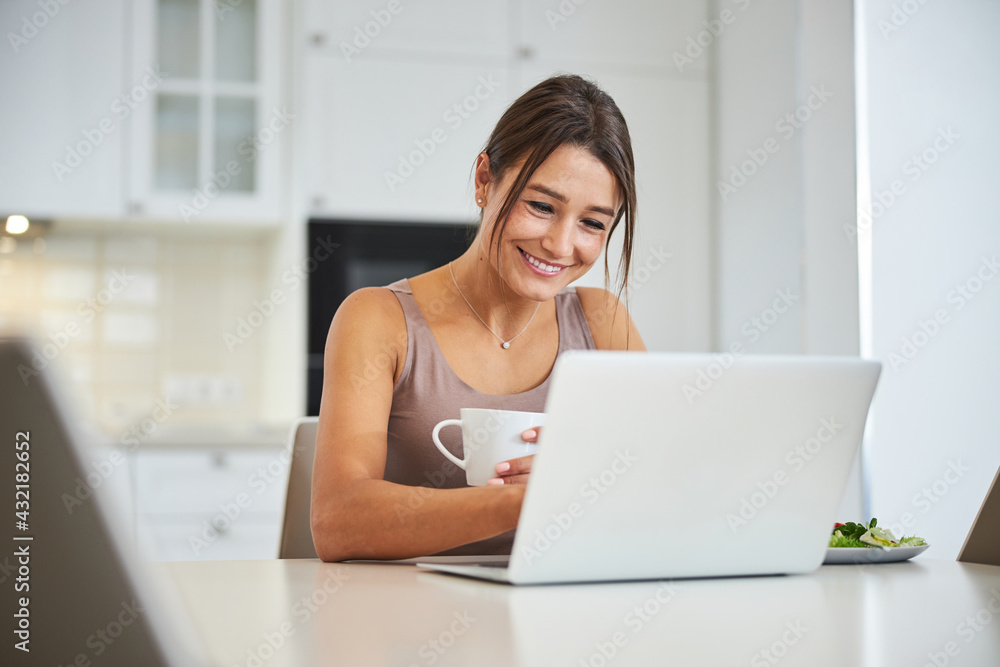 Pleased female person having online video conference Pleased female person having online video conference
