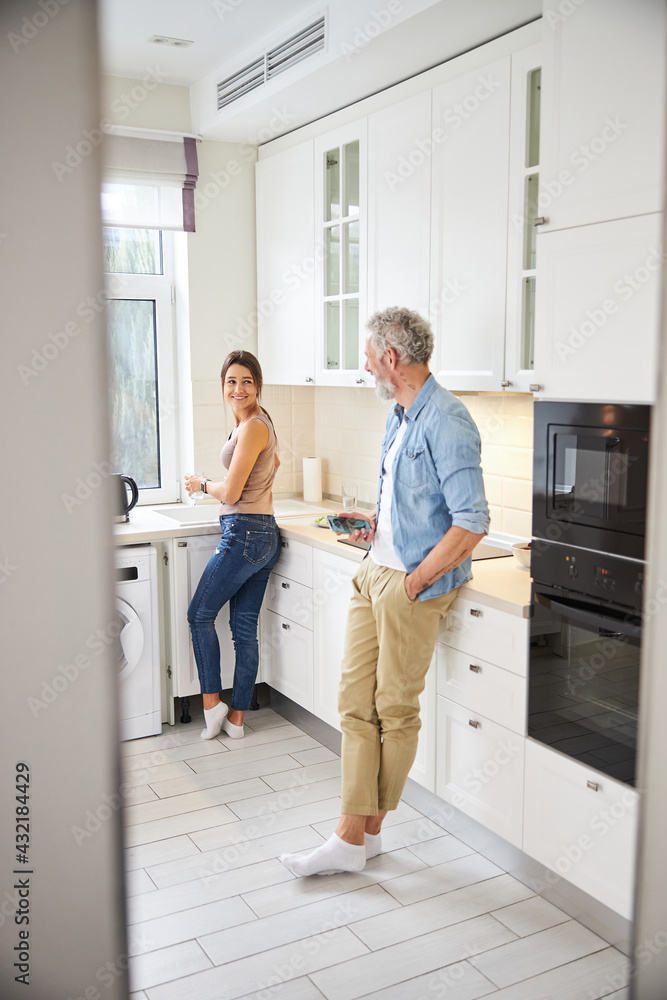 Delighted female person laughing to her partner Delighted female person laughing to her partner