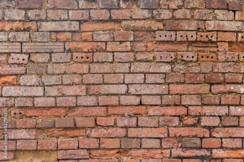 Old and broken brick wall texture