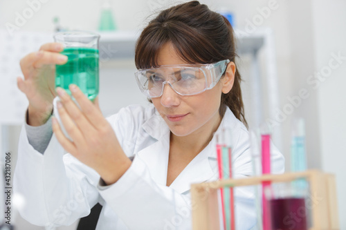 a woman is working in lab