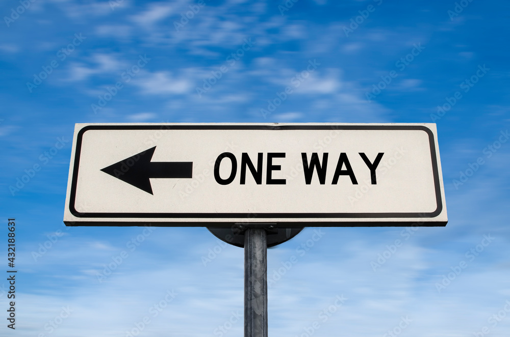 One way road sign, arrow on blue sky background. One way blank road sign with copy space. Arrow on a pole pointing in one direction. One way road sign, arrow on blue sky background. One way blank road sign with copy space. Arrow on a pole pointing in one direction.