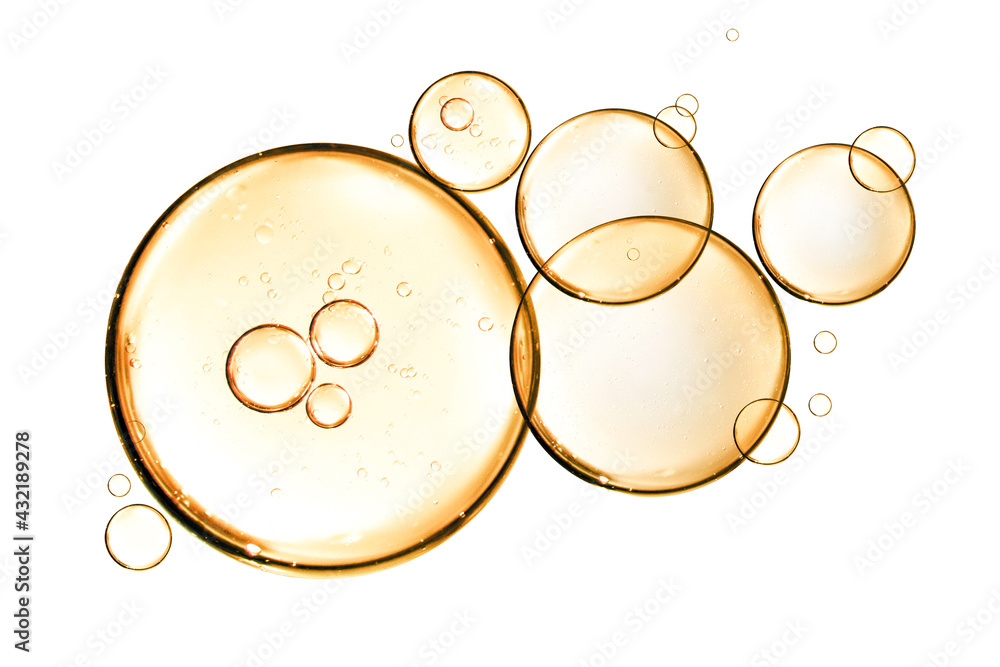 golden yellow bubble oil or serum isolated on white background - obrazy, fototapety, plakaty 