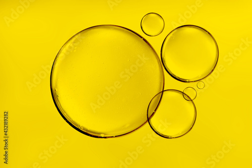 golden yellow bubble oil or serum isolated on white background
