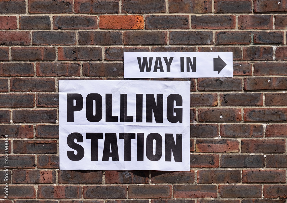 Sign indicating polling station for local elections.