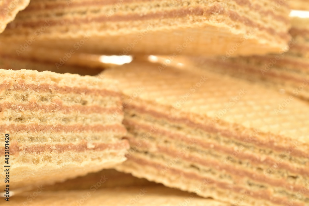 Several vanilla waffles, close-up, isolated on white. Several vanilla waffles, close-up, isolated on white.