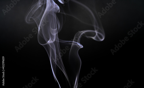 Movement color smoke girl black background with copy space.